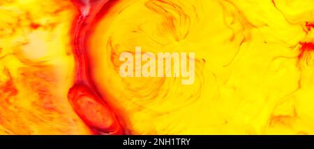 Fluid Art. Liquid red orange colors paint background. Colorful abstract watercolor texture. Liquid art concept Stock Photo