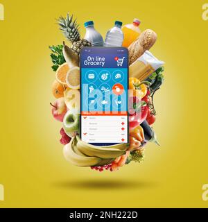 Online grocery shopping app: shopping list on smartphone and fresh groceries Stock Photo