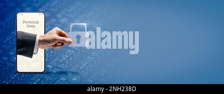 Businessman hand coming out of a smartphone screen and holding a lock, personal data protection concept Stock Photo