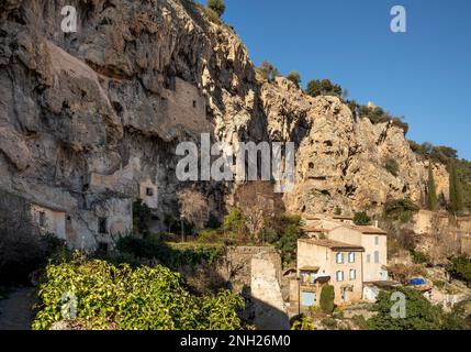 Cotignac is a French village in the Var department of the Provence-Alpes-Côte d'Azur region. It is famous for its troglodyte dwellings that are carved Stock Photo