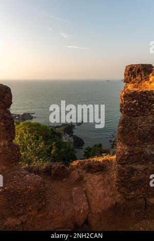 aerial view of the coastline and seascape during sunset, from the ruins of the Cabo De Rama fort at Canacona in South Goa, India. Stock Photo