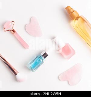 Self care flat lay. Square composition with personal care tools and accessories on white background. Stock Photo