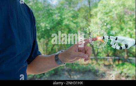 Robot and human hand with flash light with modern interface icons, Farmers analyze yields with smart technology for business growth in farm, ESG, envi Stock Photo