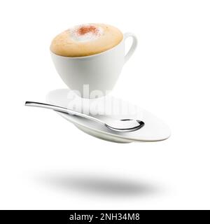 cup of cappuccino with saucer and spoon floating on white background Stock Photo
