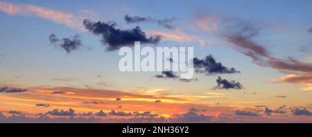 Beautiful colored cloudy evening sky. Sky with clouds at sunset. Abstract sky background. Stock Photo