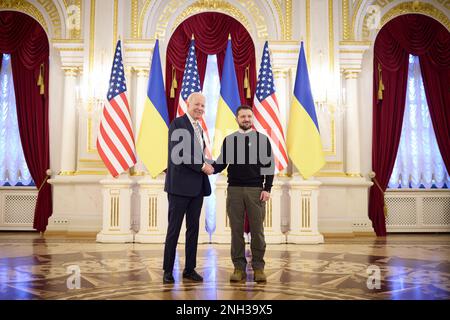 (230220) -- KIEV, Feb. 20, 2023 (Xinhua) -- Ukrainian President Volodymyr Zelensky (R) meets with U.S. President Joe Biden in Kiev, Ukraine, Feb. 20, 2023. U.S. President Joe Biden made an unannounced visit here on Monday, one day after thousands rallied in Washington to protest against the United States' war-mongering foreign policy and its role in various conflicts across the globe. Biden held talks with his Ukrainian counterpart, Volodymyr Zelensky, about the situation on the frontline in Ukraine and announced an additional 500 million U.S. dollars in military aid for Ukraine on top of Stock Photo