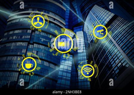 Different virtual icons and modern buildings on background. Smart city ...
