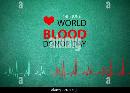 Text 14th June World Blood Donor Day on green background Stock Photo