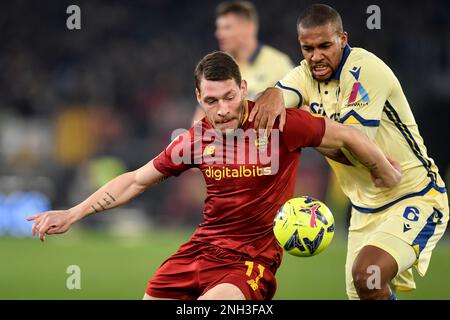 Andrea Belotti of AS Roma and Isak Hien of Hellas Verona compete for the ball during the Serie A football match between AS Roma and Hellas Verona at O Stock Photo