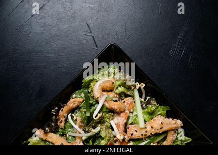 homemade oriental meal cooking fried squid salad Stock Photo