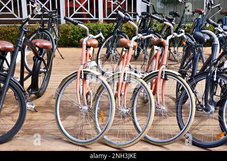 Old retro bicycles in the parking lot Stock Photo