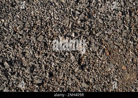 Background with small gray grit stones on the bottom Stock Photo