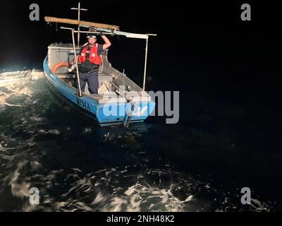 A Coast Guard Air Station Miami HC-144 Ocean Sentry aircrew notified Sector Key West watchstanders of this migrant vessel about 25 miles south of Bahia Honda, Florida, Dec. 11, 2022. The people were repatriated to Cuba on Dec. 14, 2022. (U.S. Coast Guard photo) Stock Photo