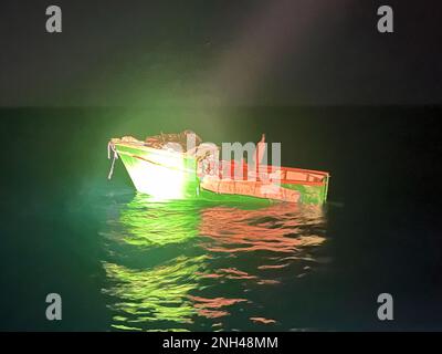 A Coast Guard Air Station Miami HC-144 Ocean Sentry aircrew notified Sector Key West watchstanders of this migrant vessel about 20 miles south of Indian Key, Florida,  Dec. 11, 2022. The people were repatriated to Cuba on Dec. 14, 2022. Stock Photo