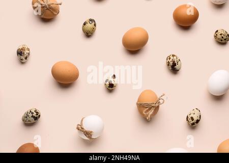 Different Easter eggs on pink background Stock Photo