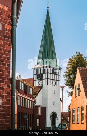 Street of Ronne largest town on island. View to St. Nicolas Church. Stock Photo