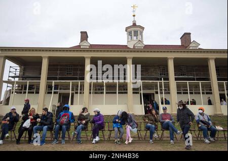 Mt Vernon, United States. 20th Feb, 2023. People sit overlooking the Potomac River outside Mount Vernon, the home of George and Martha Washington, in Mt. Vernon, Virginia on Monday, Feb. 20, 2023. People gathered for war reenactments, musical numbers and house tours to celebrate Presidents Day and George Washington's birthday. Photo by Bonnie Cash/UPI Credit: UPI/Alamy Live News Stock Photo