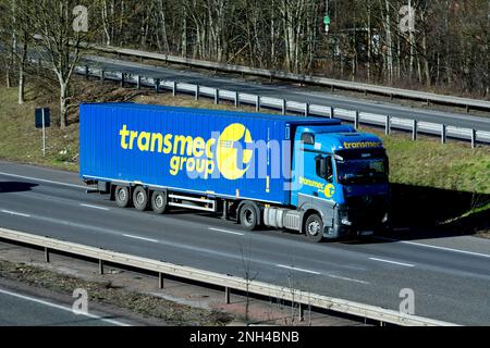 A Transmec Group lorry on the M40 motorway, Warwickshire, UK Stock Photo
