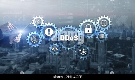 Man clicks on virtual screen with text DDoS Cyber Attack Stock Photo