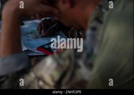 Members of the Malawian Maritime Force get taught proper pre-mission planning by a U.S. Operational Detachment Alpha (ODA) team during a Joint Combined Exchange Training (JCET) in Monkey Bay, Malawi, June 20, 2022.  JCETS enhance U.S. relationships with partner nations by developing and maintaining critical military-to-military connections and improving joint and allied readiness and interoperability. Stock Photo