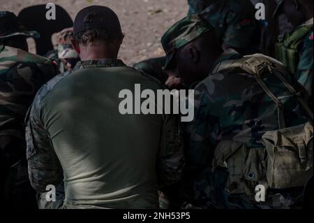 Members of the Malawian Maritime Force get taught proper pre-mission planning by a U.S. Operational Detachment Alpha (ODA) team during a Joint Combined Exchange Training (JCET) in Monkey Bay, Malawi, June 20, 2022.  JCETS enhance U.S. relationships with partner nations by developing and maintaining critical military-to-military connections and improving joint and allied readiness and interoperability. Stock Photo