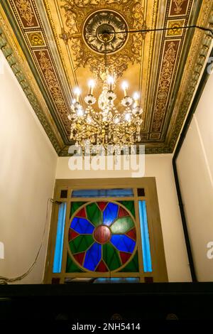 Stained glass, colored glass, colourful glass indoor on stairs Ottoman building Istiklal street Beyouglu Istanbul Turkey Stock Photo