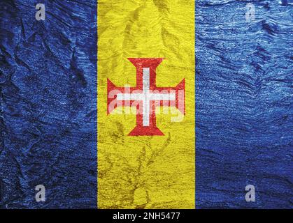 Flag of Madeira on a textured background. Concept collage. Stock Photo