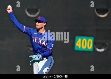 Texas Rangers Leody Taveras throws during spring training baseball practice  Monday, Feb. 20, 2023, in Surprise, Ariz. (AP Photo/Charlie Riedel Stock  Photo - Alamy