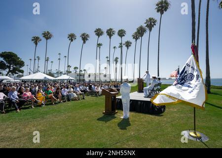 Coastguardsmen and members of the public attend a change of command ceremony for Coast Guard Sector Los Angeles-Long Beach, San Pedro, California, June 21, 2022. Rear Admiral Brian Penoyer, Coast Guard District Eleven commander presided over over the change of command and Rear Admiral Rebecca Ores promotion ceremony. Stock Photo