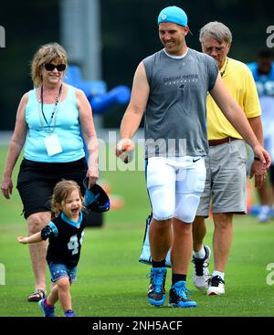 Spartanburg, USA. 08th Jan, 2012. In this file photo, Carolina Panthers long snapper J.J. Jansen squirts water at his daughter, Sarah following practice on July 28, 2017, at Wofford College in Spartanburg, SC. (Photo by Jeff Siner/Charlotte Observer/TNS/Sipa USA) Credit: Sipa USA/Alamy Live News Stock Photo