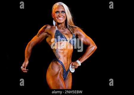 Female Figure Model Shows Her Best at Championship on Stage Editorial Stock  Image - Image of flexing, editorial: 66674579