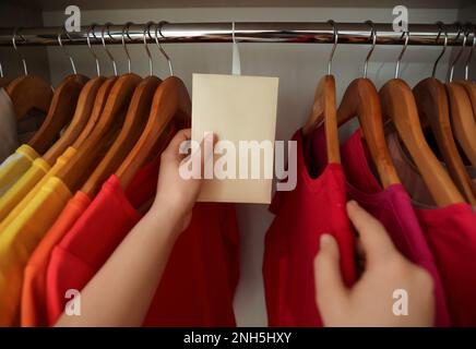 Scented sachet with flowers and stylish clothes on hanger Stock Photo -  Alamy