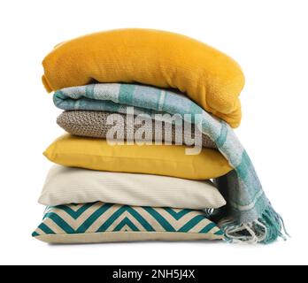 Stylish soft pillows and blankets on white background Stock Photo