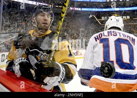 Pittsburgh Penguins' Jason Zucker, right, celebrates his goal during the  second period of an NHL hockey game against the New York Rangers in  Pittsburgh, Sunday, March 12, 2023. (AP Photo/Gene J. Puskar