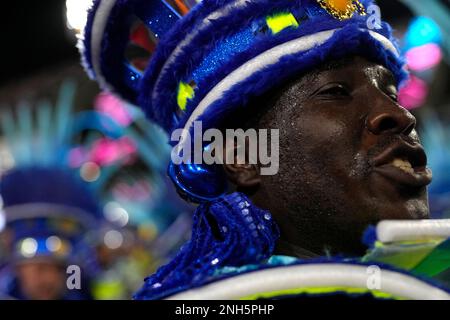 A performer from the Paraiso do Tuiuti samba school parades during