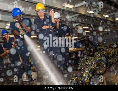 220719-N-JR318-1023 PALMA DE MALLORCA, SPAIN (July 19, 2022) Sailors clear debris off of the anchor chain in the fo'c'sle of the Nimitz-class aircraft carrier USS Harry S. Truman (CVN 75), July 19, 2022. The Harry S. Truman Carrier Strike Group is on a scheduled deployment in the U.S. Naval Forces Europe area of operations, employed by U.S. Sixth Fleet to defend U.S., allied and partner interests. Stock Photo