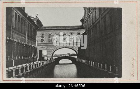 Vintage photo of the winter canal in St. Petersburg. 1875 - 1885  Winter Canal is a canal in Saint Petersburg, Russia, connecting Bolshaya Neva with Moika River in the vicinity of Winter Palace. The canal was dug in 1718–19. It is only 228 metres (748 ft) long, which makes it one of the shortest canals in the city. The width is about 20 metres (66 ft). Stock Photo
