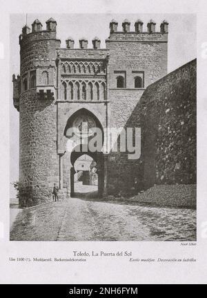 Architecture of Old Spain. Vintage photo of La Puerta del Sol. Around 1100. Mudejar style. Brick decoration. Toledo, Spain Puerta del Sol is a city gate of Toledo, Spain, built in the late 14th century by the Knights Hospitaller. Stock Photo