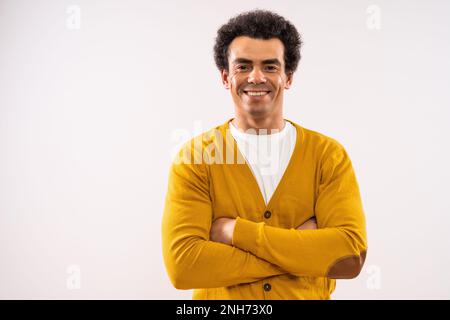 Studio shot portrait of happy smiling multiracial man. Man is looking at camera and smiling. Stock Photo