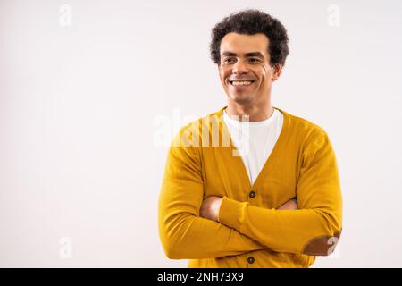 Studio shot portrait of happy smiling multiracial man. Man is looking at camera and smiling. Stock Photo