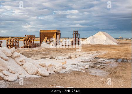 Forklifts at work, salt pans of Trapani Stock Photo