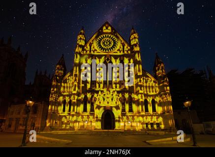 ‘Colour and Light’ immersive projection experience by Doubletake Projections using projection on the facade of the South Transept, York Minster, UK. Stock Photo