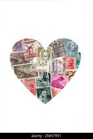 Vintage postage stamps from Spain in the shape of a heart. Stock Photo