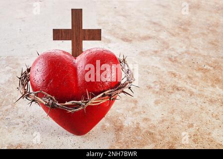 Sacred Heart of Jesus, surrounded by a crown of thorns and with wooden ...