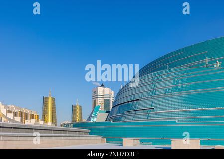 Modern city of Astana. Beautiful towers, glass skyscrapers and architecture of future in urban life. High quality photo Stock Photo