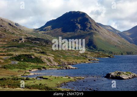 The Wainwright Yewbarrow from the Shores of Wast Water  in Wasdale, Lake District National Park, Cumbria, England, UK. Stock Photo