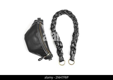 Black Leather Unisex Fanny Pack or Waist Pack Hand Bag with Detached Braided Strap Isolated on White Background Stock Photo