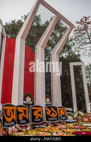Dhaka, Bangladesh. 21st Feb, 2023. View of the martyr's monument Central Shaheed Minar decorated with flowers during the International Mother Language Day, in Dhaka. Bangladeshis pay tribute at the Martyr's Monument, or Shaheed Minar, on International Mother Language Day in Dhaka, International Mother Language Day is observed in commemoration of the movement where a number of students died in 1952, defending the recognition of Bangla as a state language of the former East Pakistan, now Bangladesh. Credit: SOPA Images Limited/Alamy Live News Stock Photo