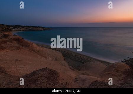 Hawaii beach in the Alikò promontory at dusk, Naxos Stock Photo