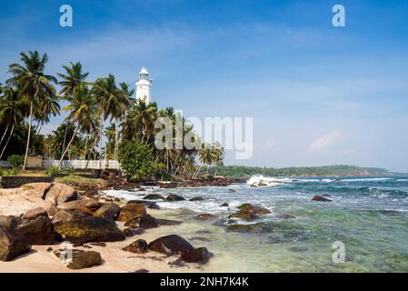 Dondra head lighthouse in the coastline of  Dondra, Southern Province, Sri Lanka Stock Photo